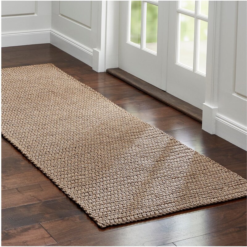 A rug for the hallway on a rubber base