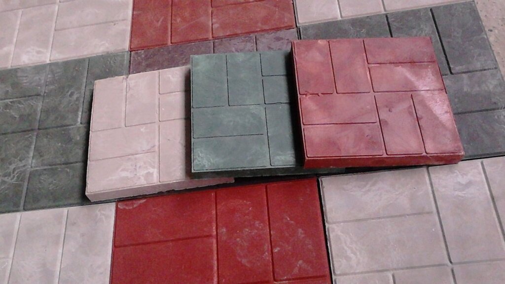 Paths made of polymer-sand tiles