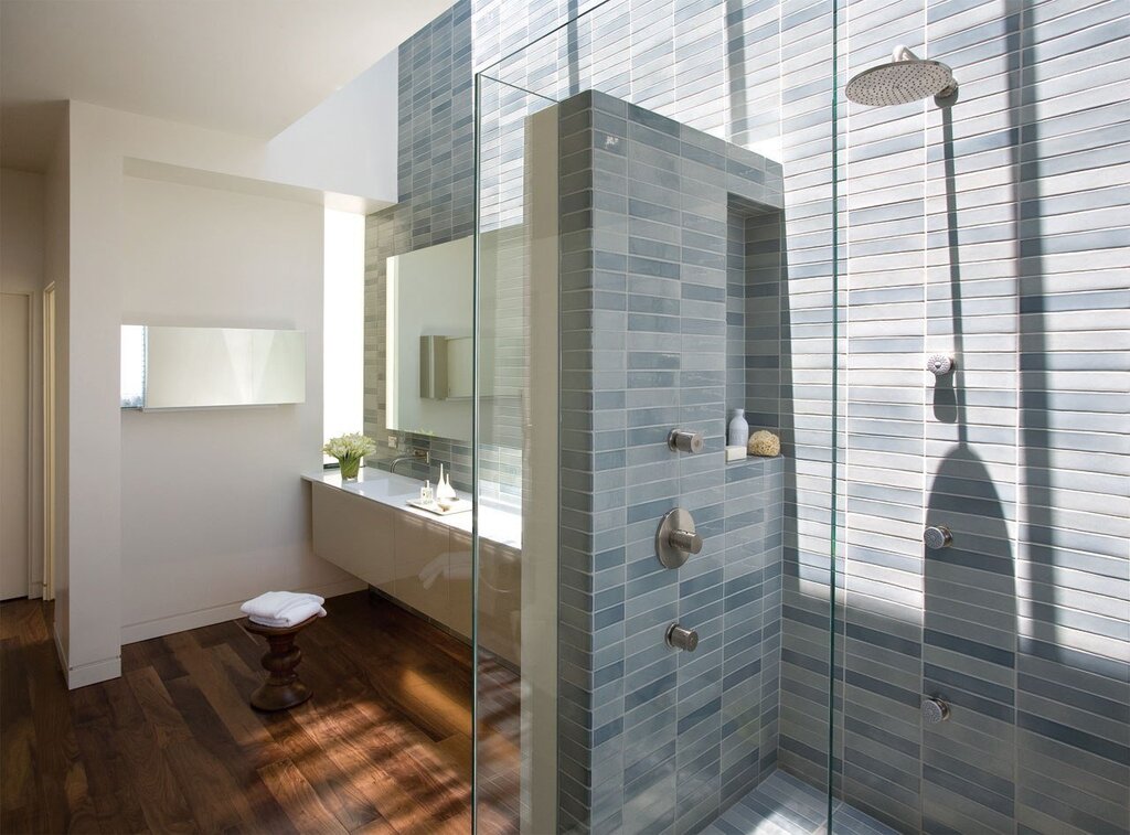 Shower with a tiled wall