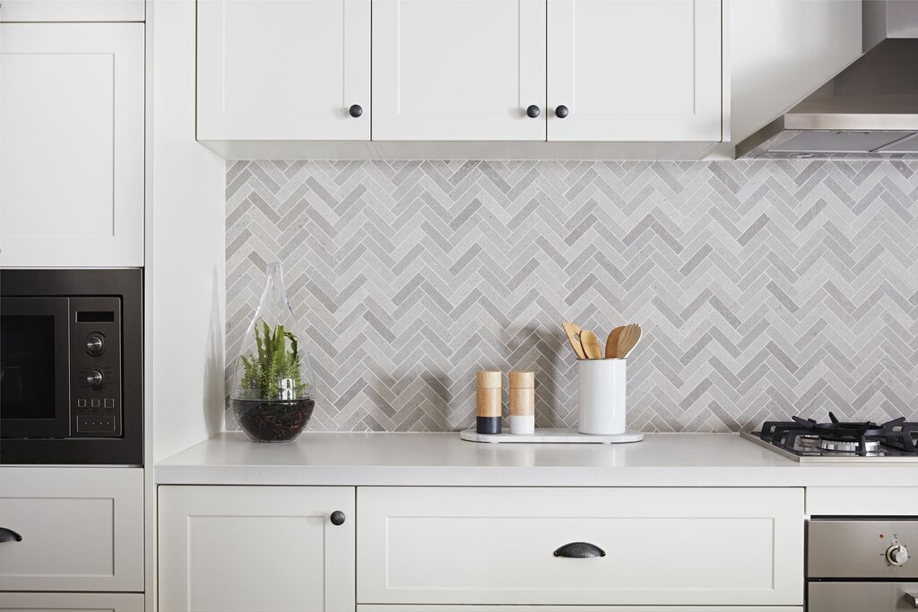 Herringbone tile kitchen backsplash