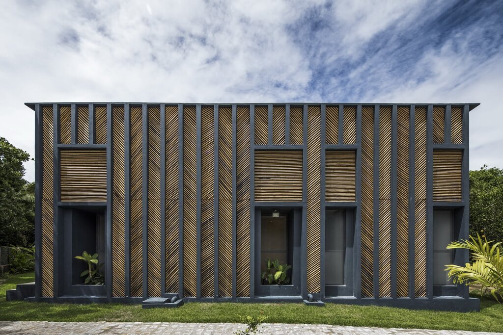 Vertical facade made of edged board