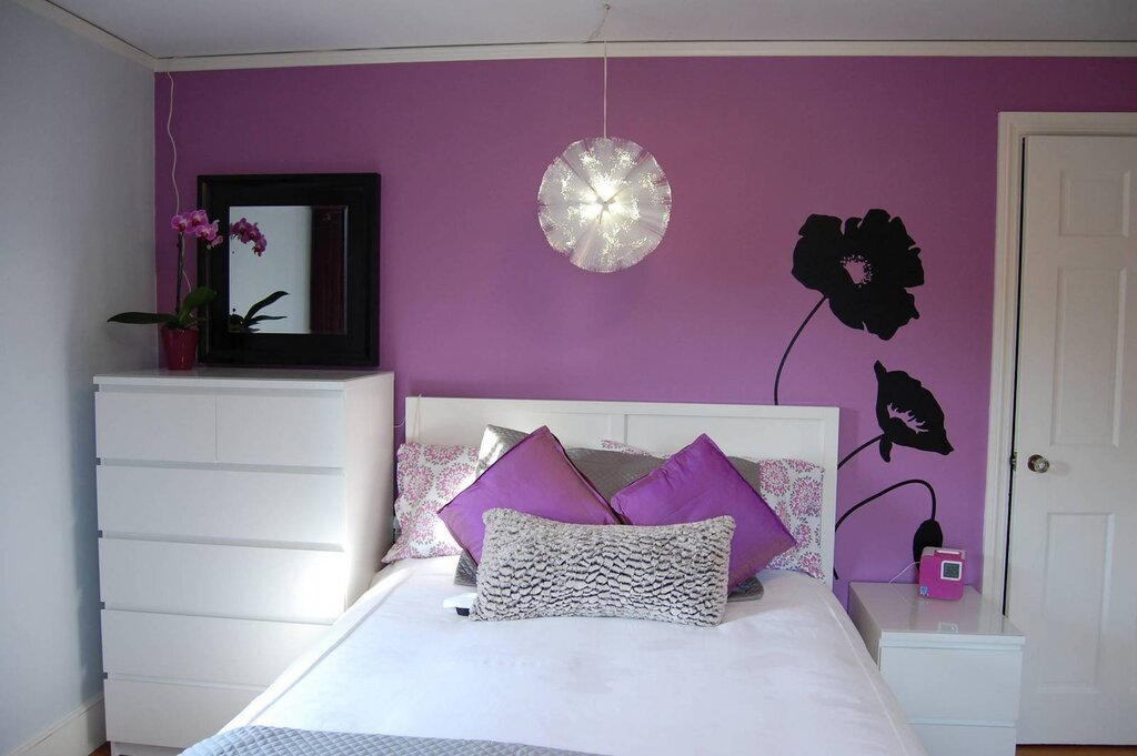 The purple walls in the room