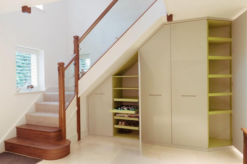 Walk-in closet under the stairs