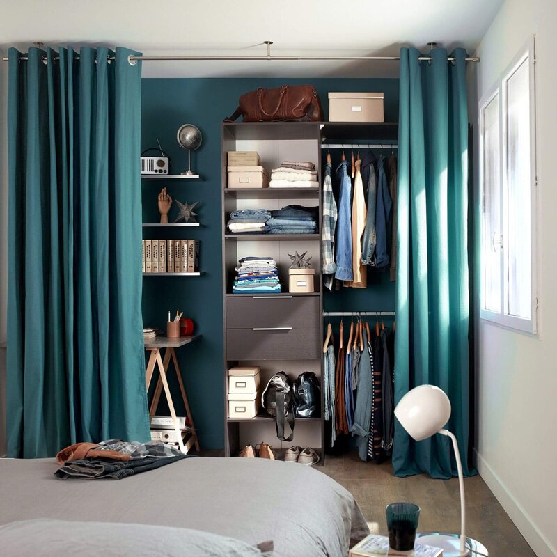 A wardrobe with curtains