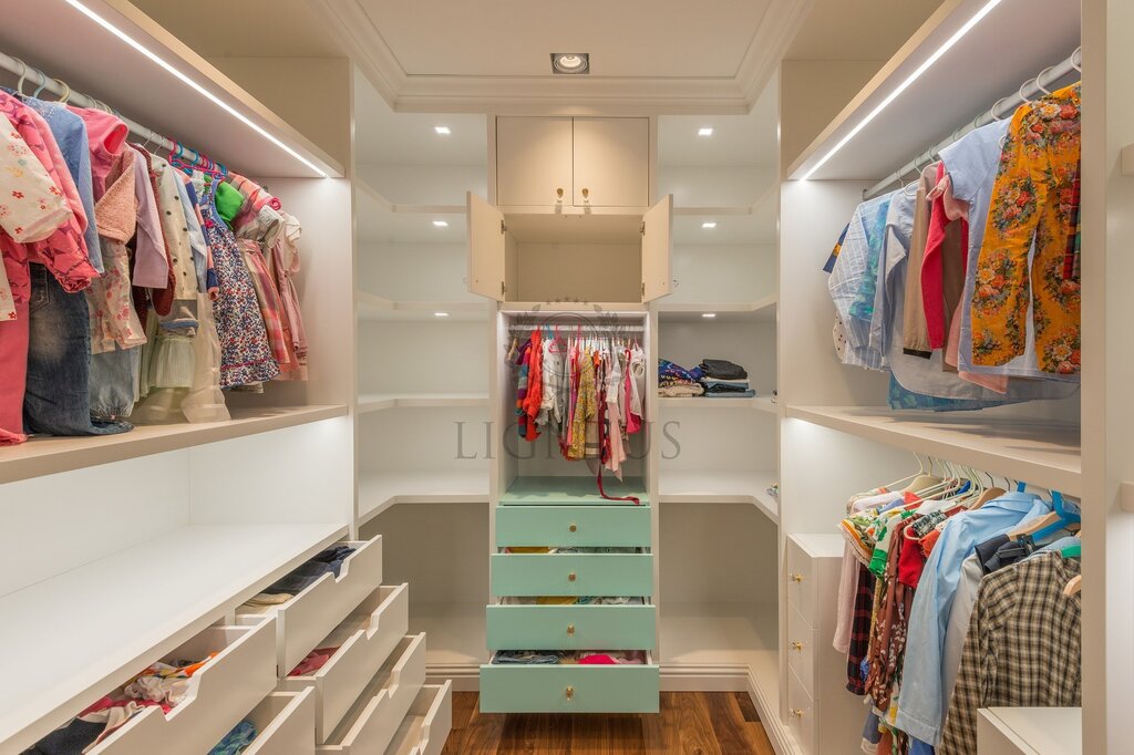 A walk-in closet in the children's room