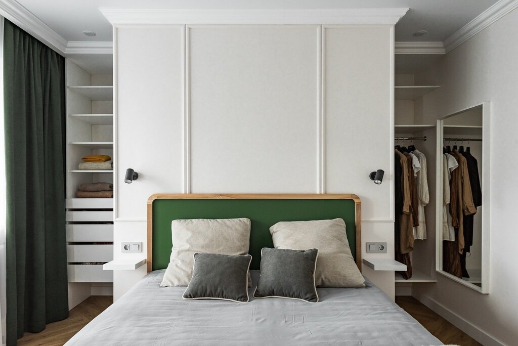 A walk-in closet in the bedroom with sliding doors