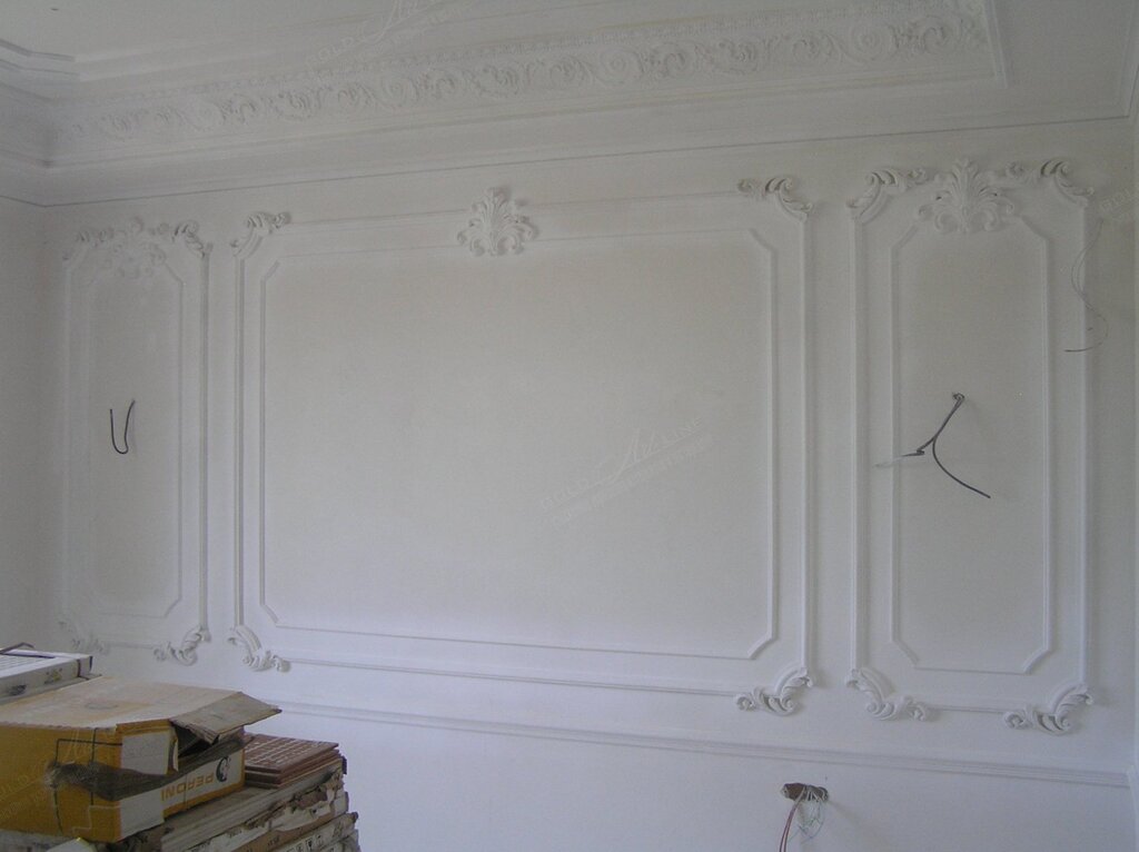 Gypsum frames on the walls