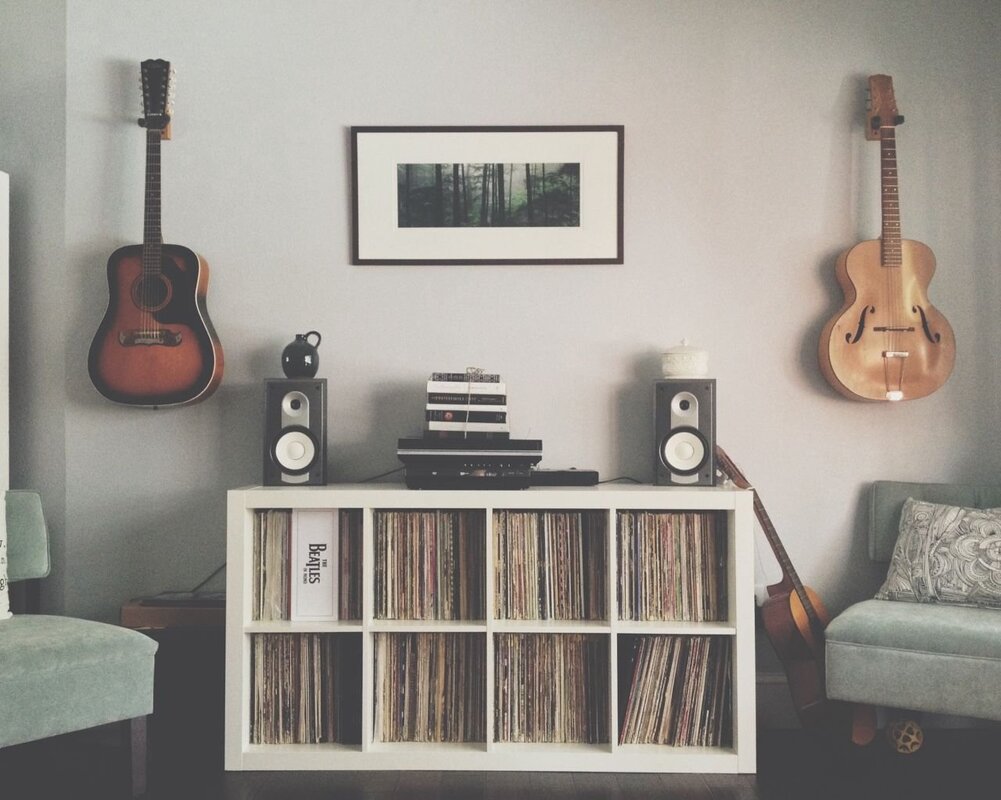 A guitar on the wall in the interior