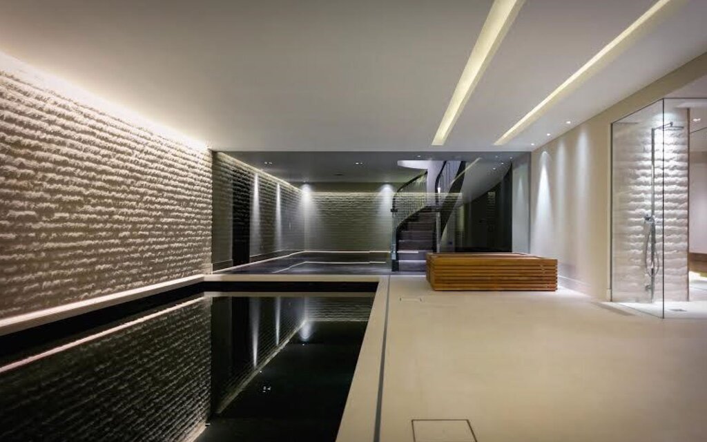 Glossy stretch ceiling with lighting