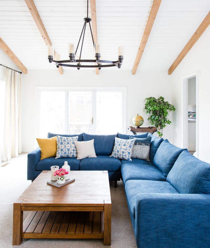 A blue sofa in the living room interior