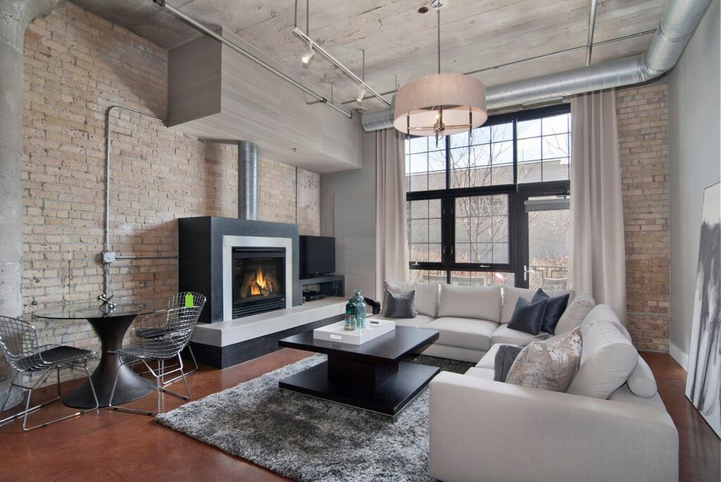 Loft living room with a fireplace