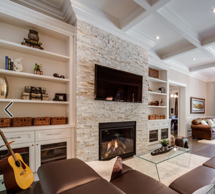 Living room with a fireplace in the apartment