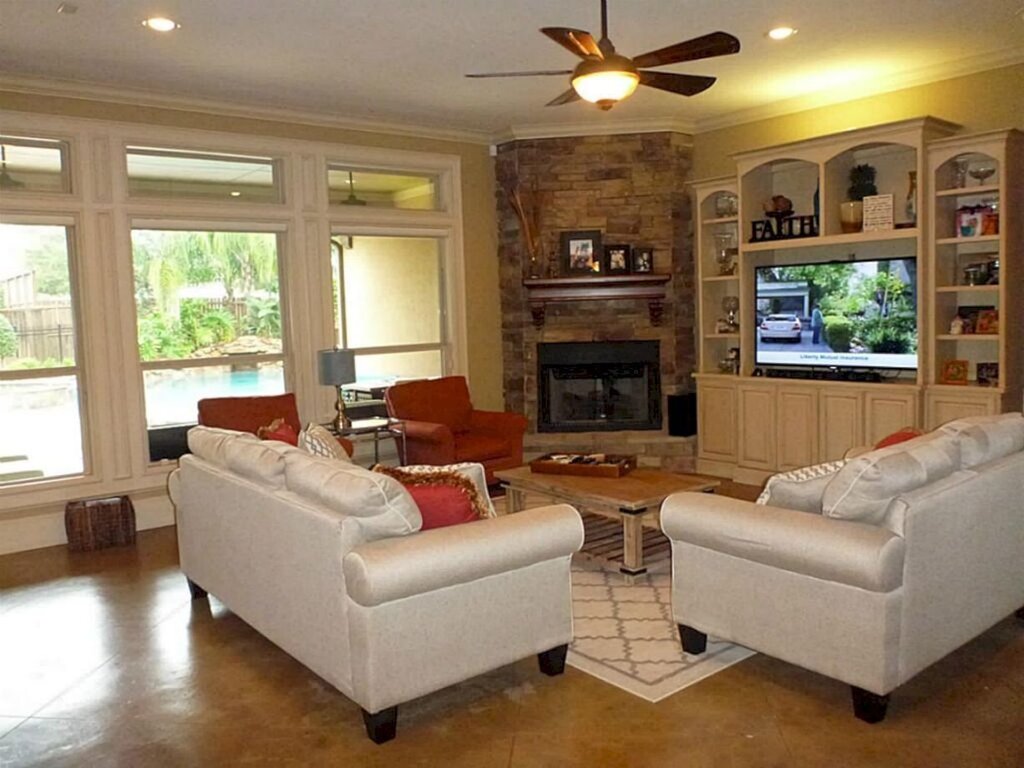 Living room with a corner fireplace