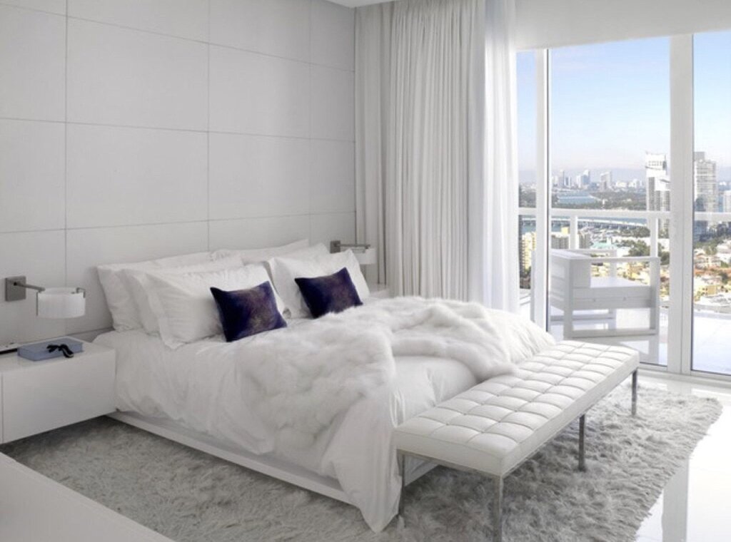 The interior of a white bedroom