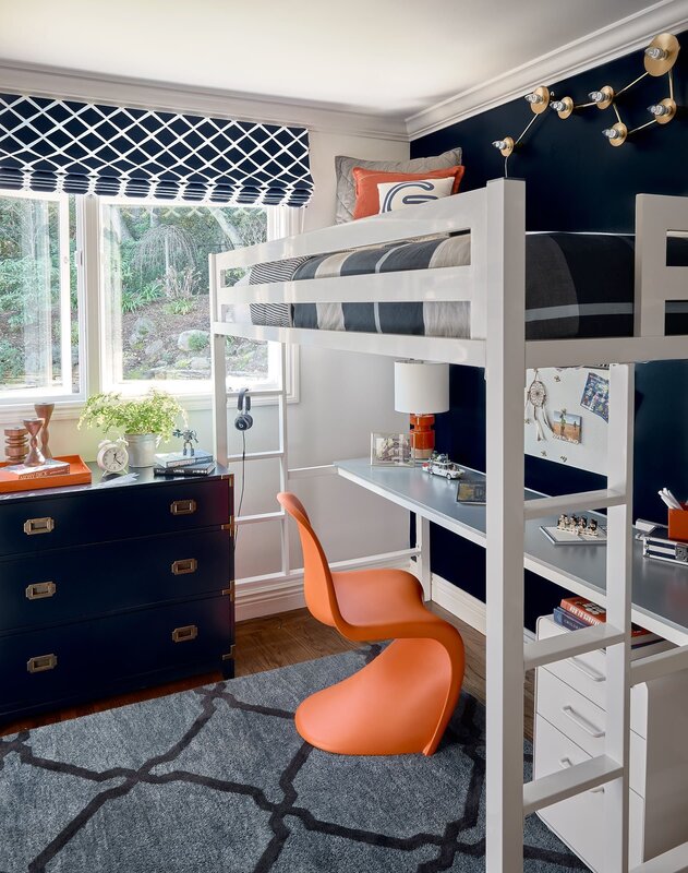 The interior of a children's room with a bunk bed