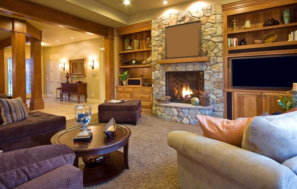 The interior of a room with a fireplace in the house