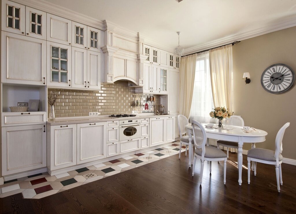 The interior of the kitchen with white furniture