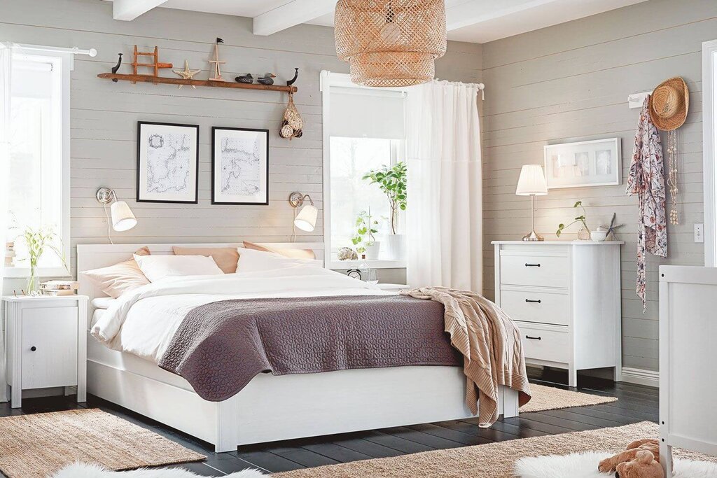 The interior of the bedroom with white IKEA furniture