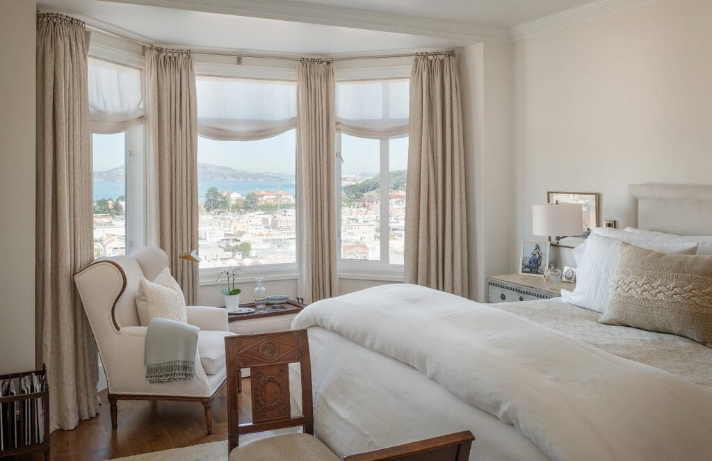 Bedroom interior with a bay window