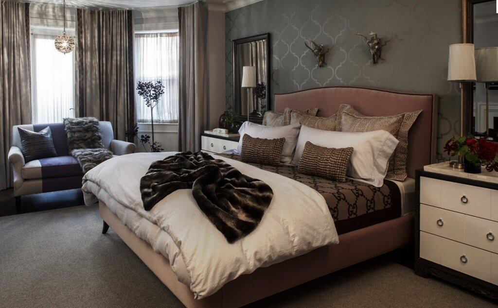 The interior of the bedroom with brown furniture