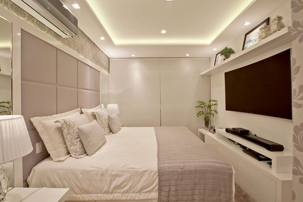 Bedroom interior with a TV