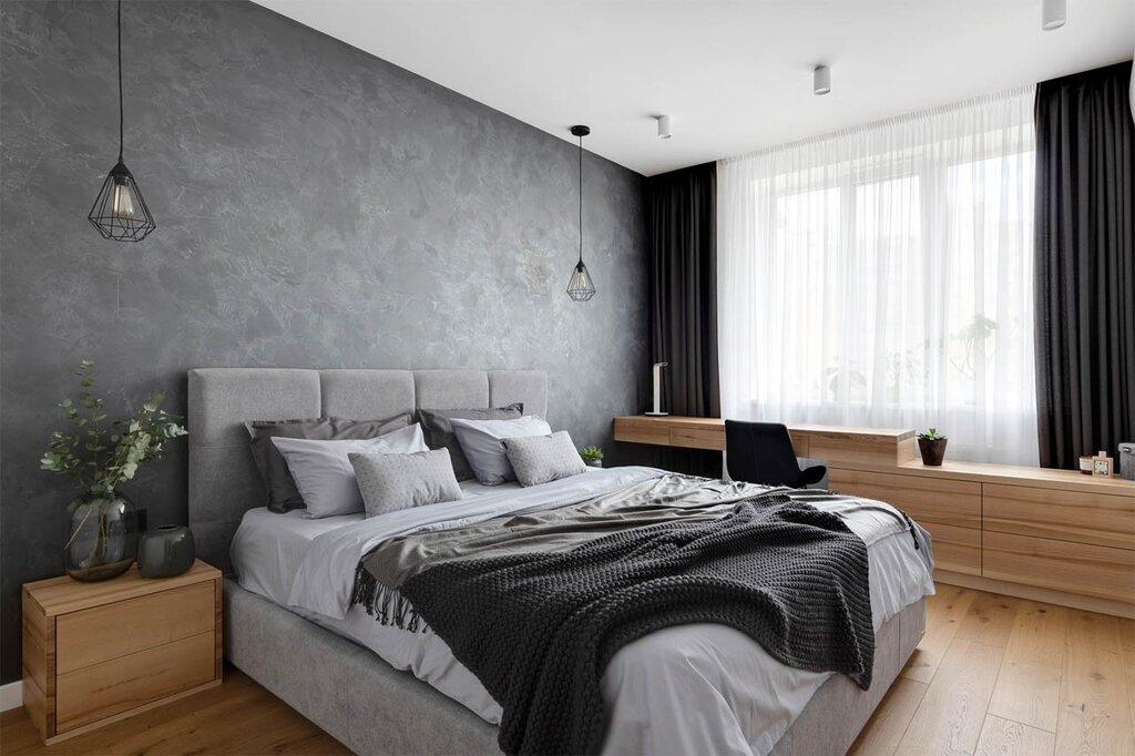 The interior of the bedroom is gray with wood