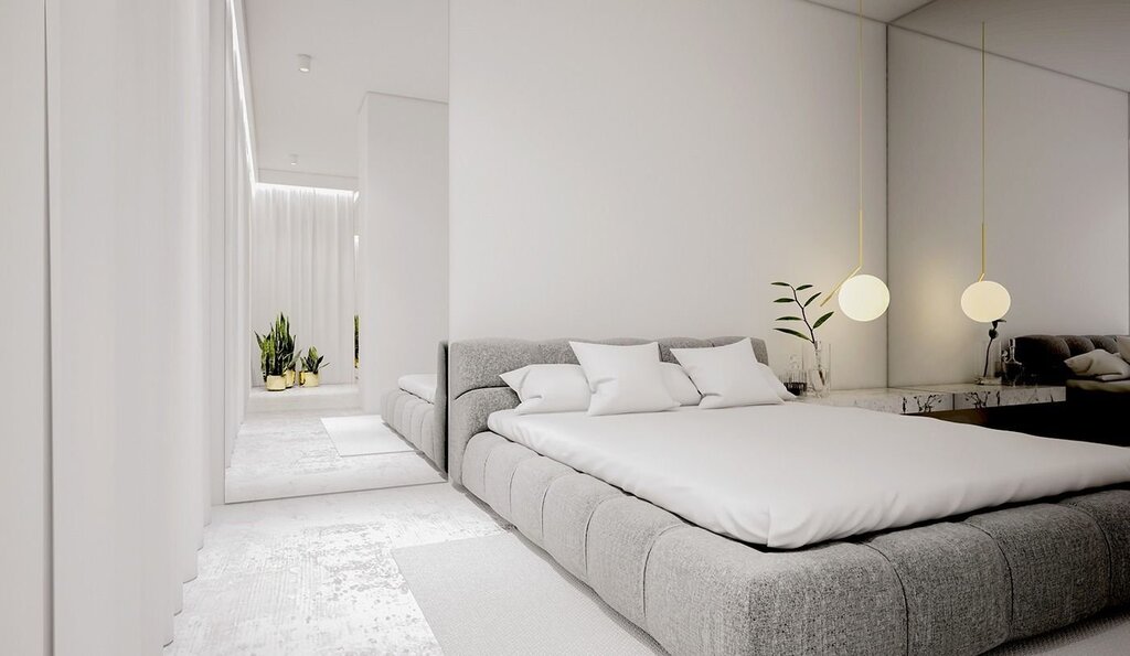 The interior of the bedroom in white tones