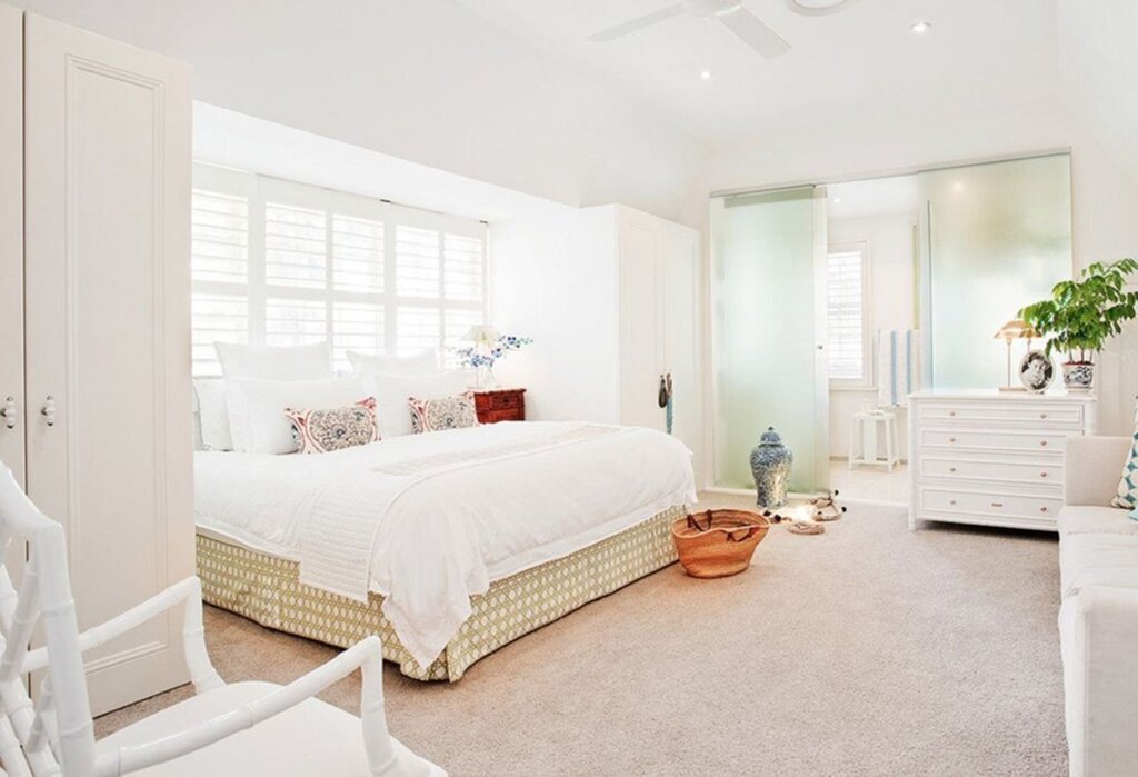 The interior of the bedroom in white color