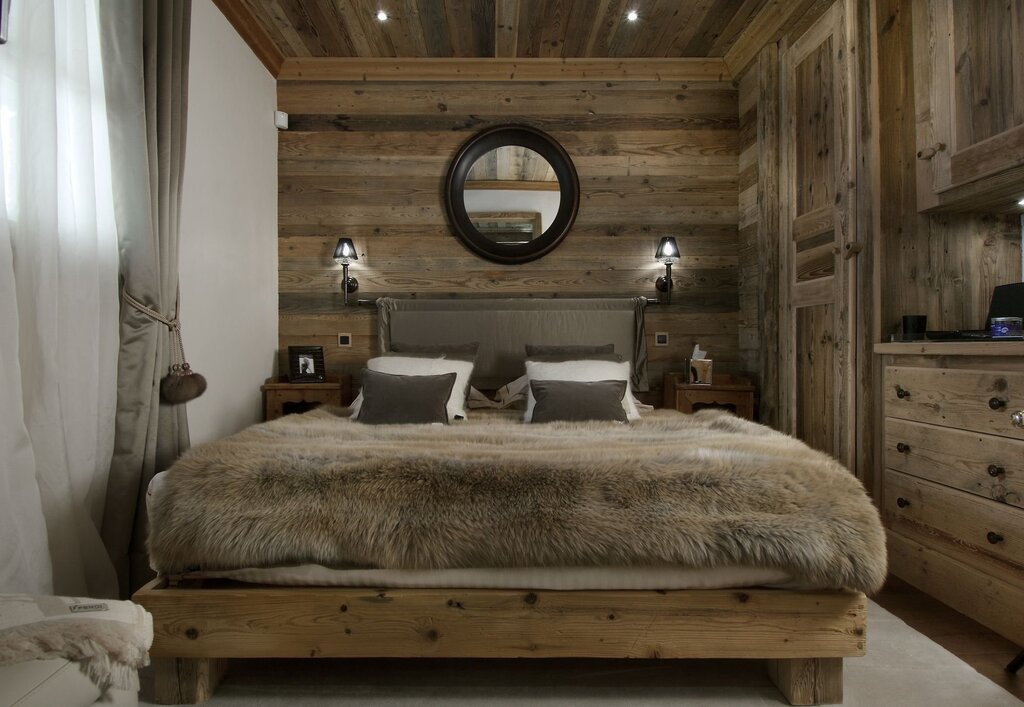 The interior of the bedroom in Chalet style