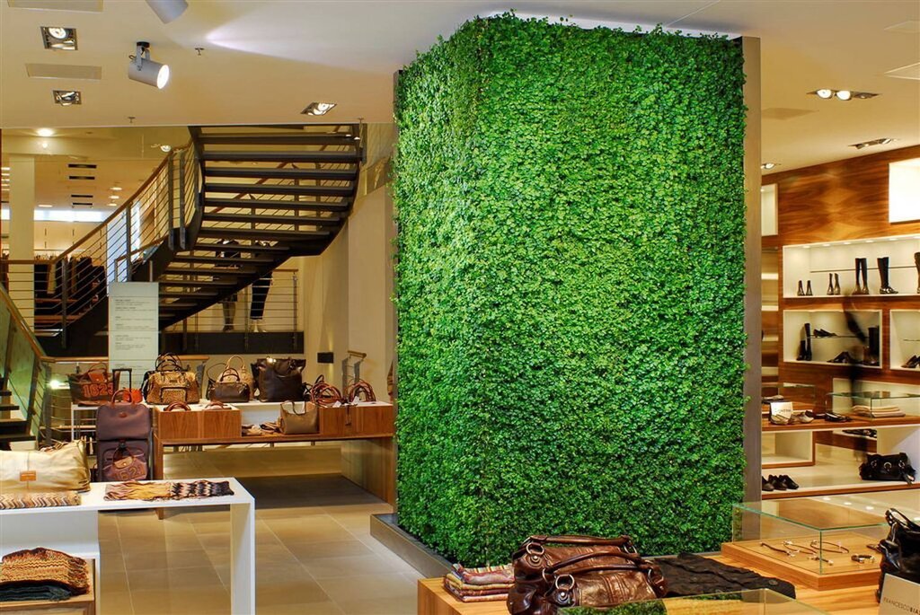 Artificial grass on the wall in the interior