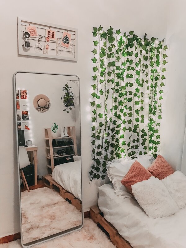 Artificial flowers in the bedroom interior