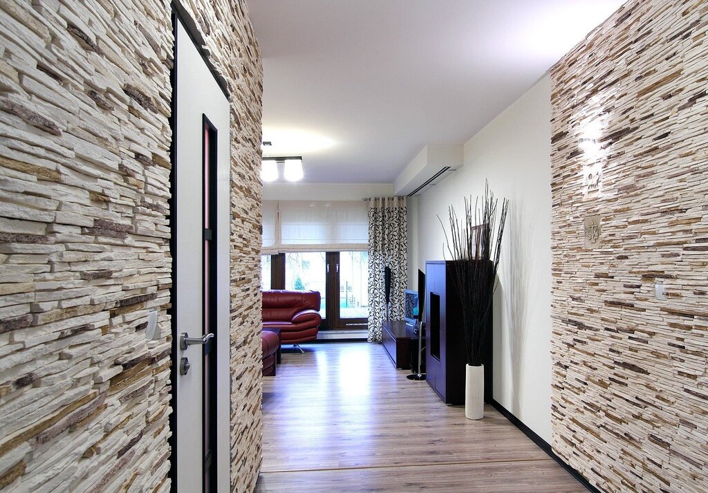 Artificial stone in the interior of the hallway