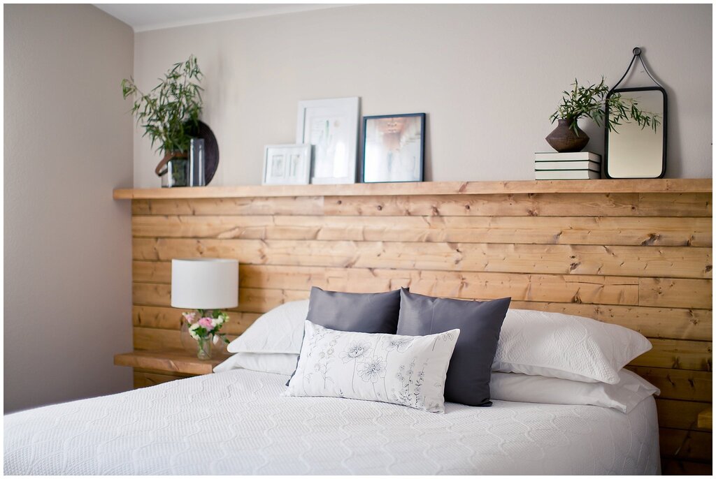 The headboard of the bed is made of planks