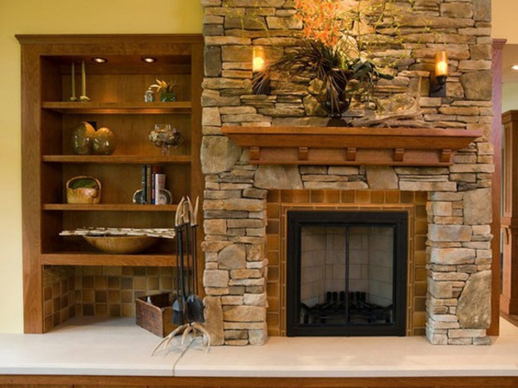 A fireplace made of decorative stone with your own hands 41 фото