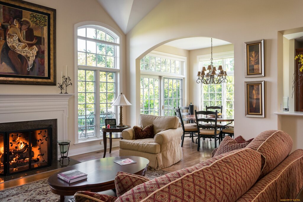 A fireplace between two windows