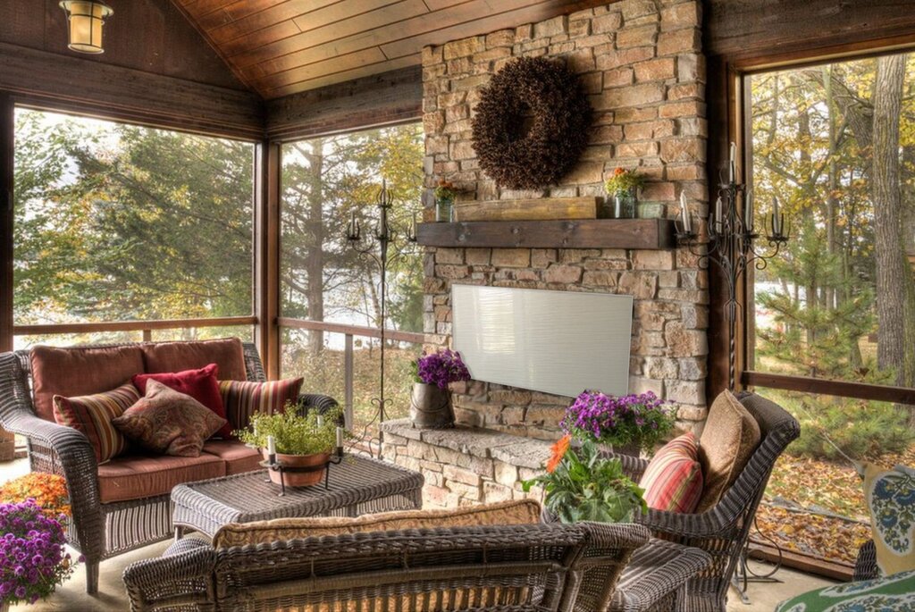 A fireplace on the veranda in a private house