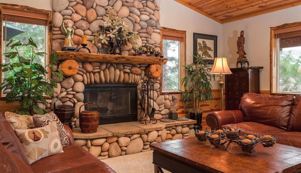 A fireplace surrounded by stone