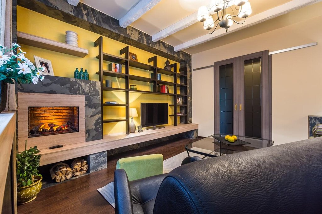 A fireplace with cabinets on the sides