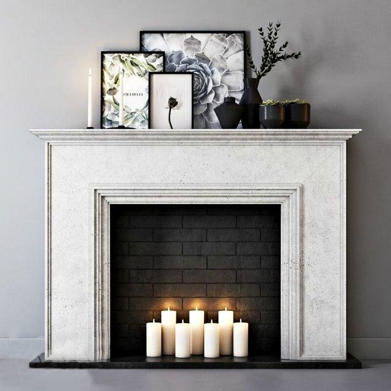 A fireplace with candles in the interior