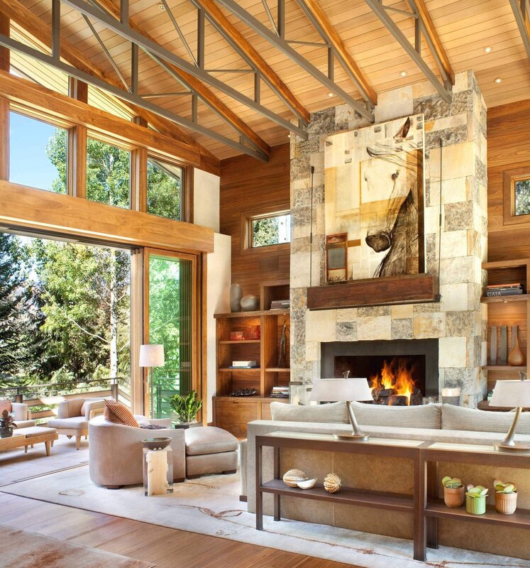 A fireplace in a log house