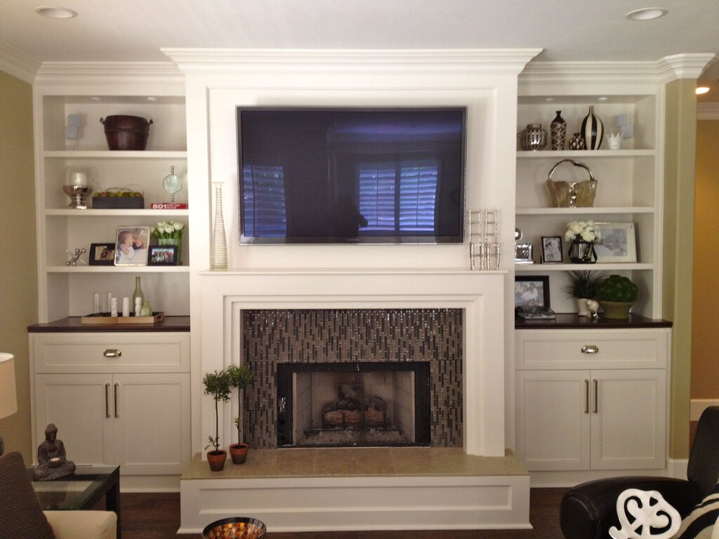 A fireplace built into the cabinet