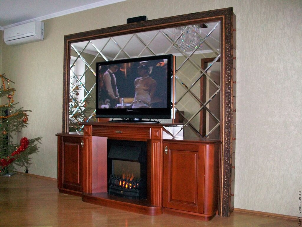 A fireplace built into the TV stand