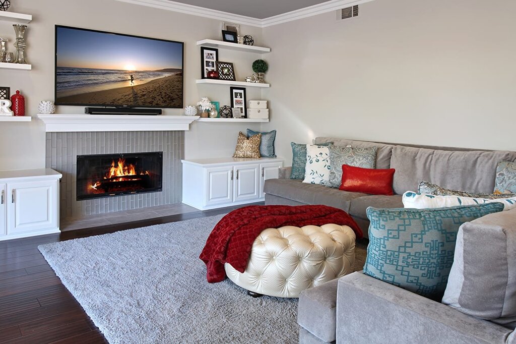 Fireplaces in the living room interior under the TV 24 фото