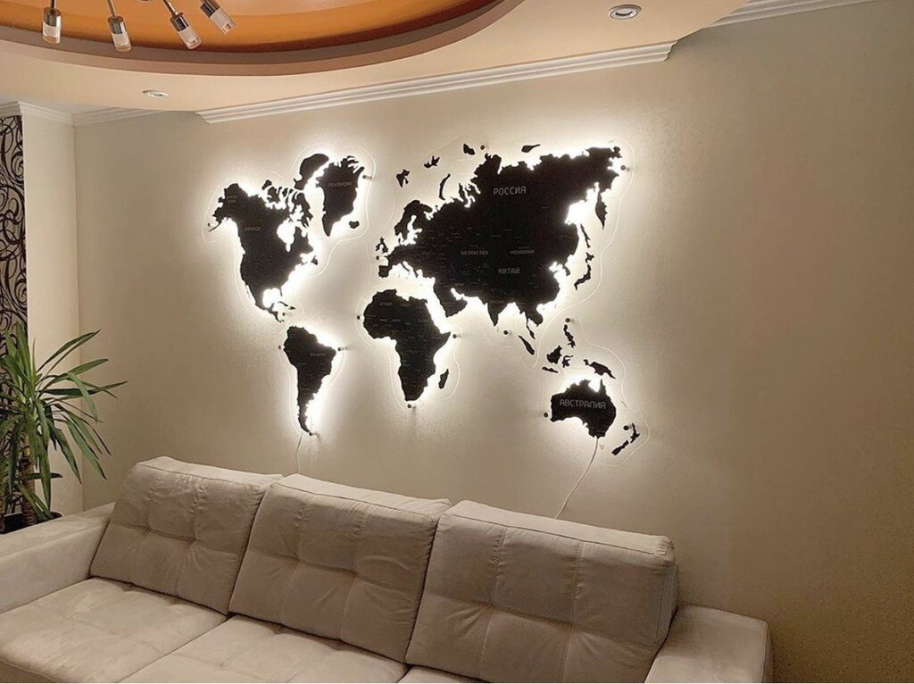 A world map with backlighting on the wall