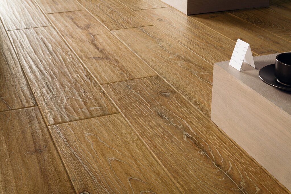 Ceramic floor tiles resembling laminate