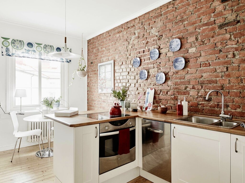 Brick wall in the kitchen interior