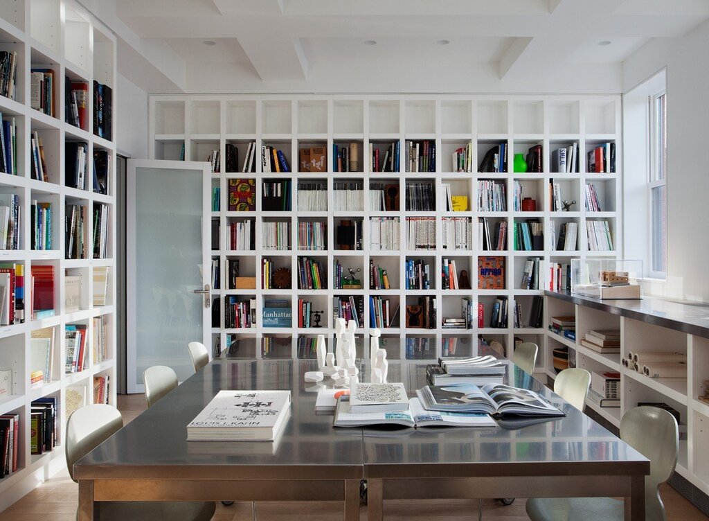 Bookshelves above the desk