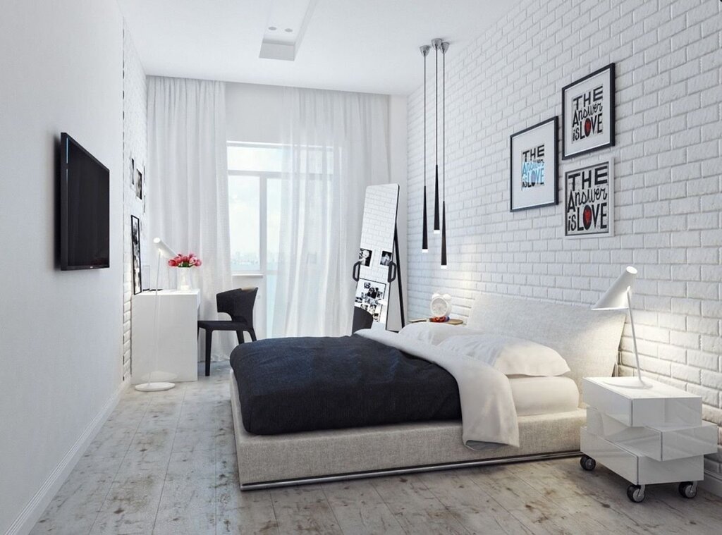 A room with a white brick wall