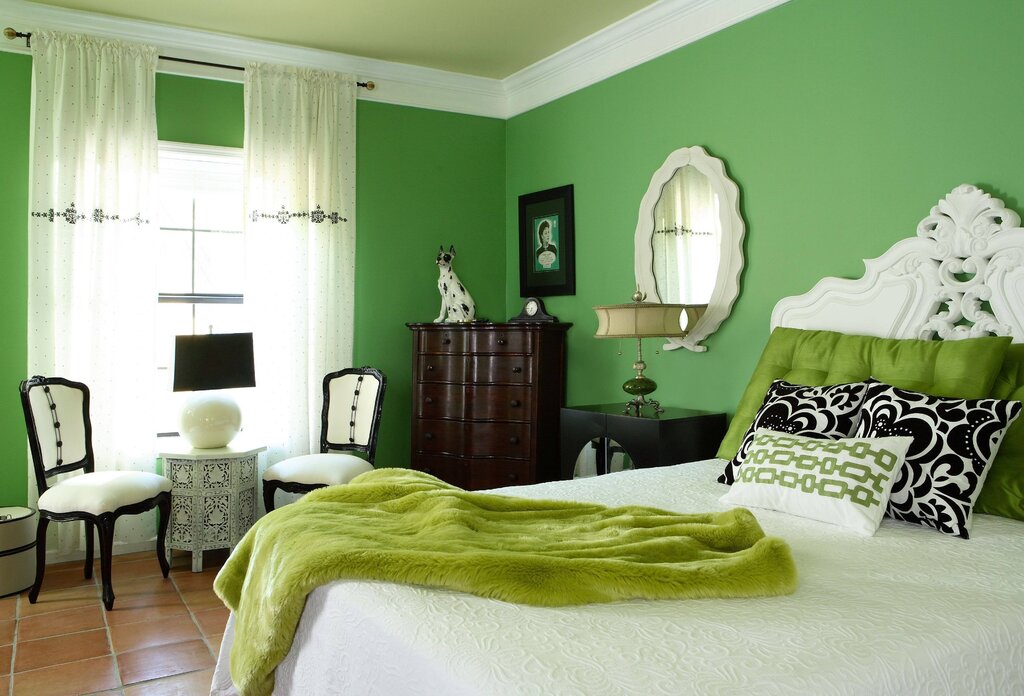 A room with green wallpaper