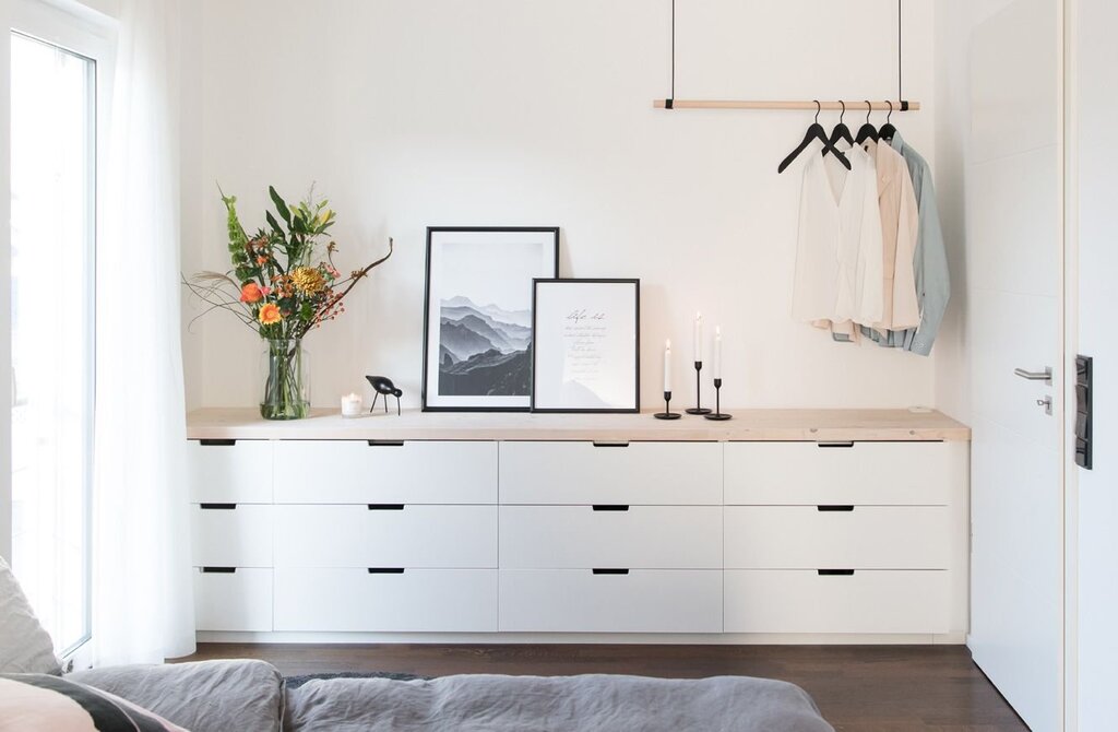 A dresser along the entire wall for the bedroom